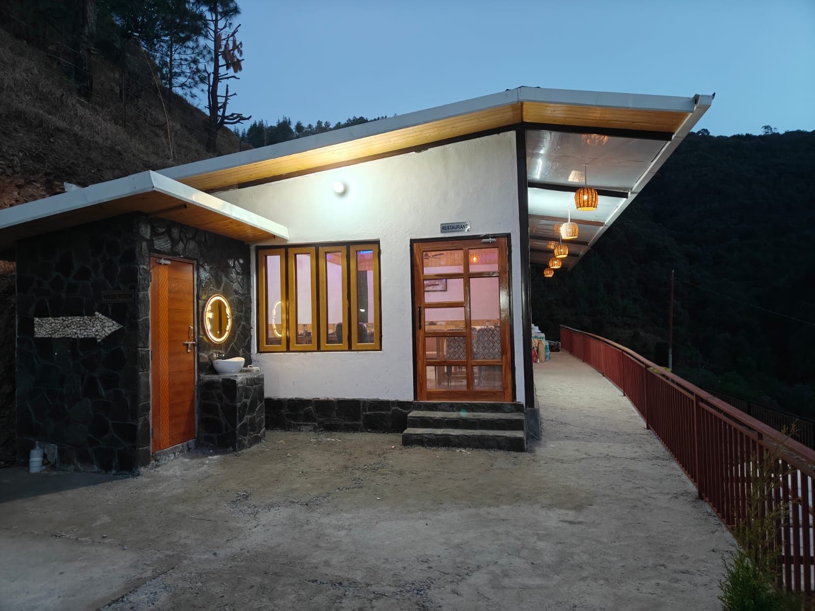 The Baan entrance sign on the hillside.